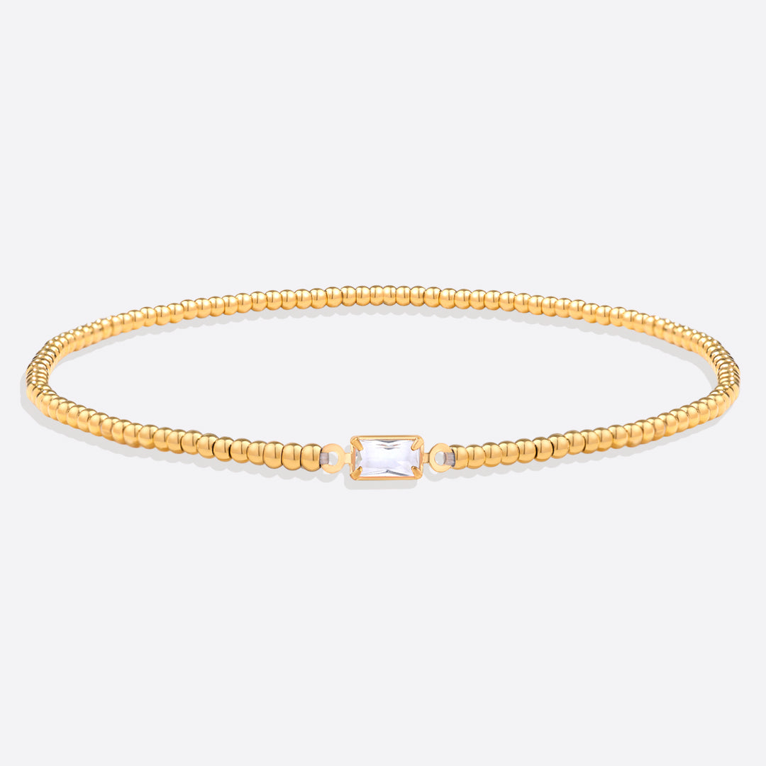 Bracelet of gold beads with birth stone