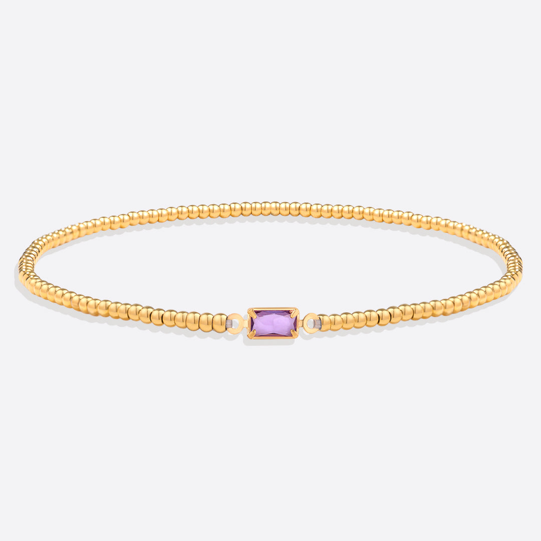 Bracelet of gold beads with birth stone