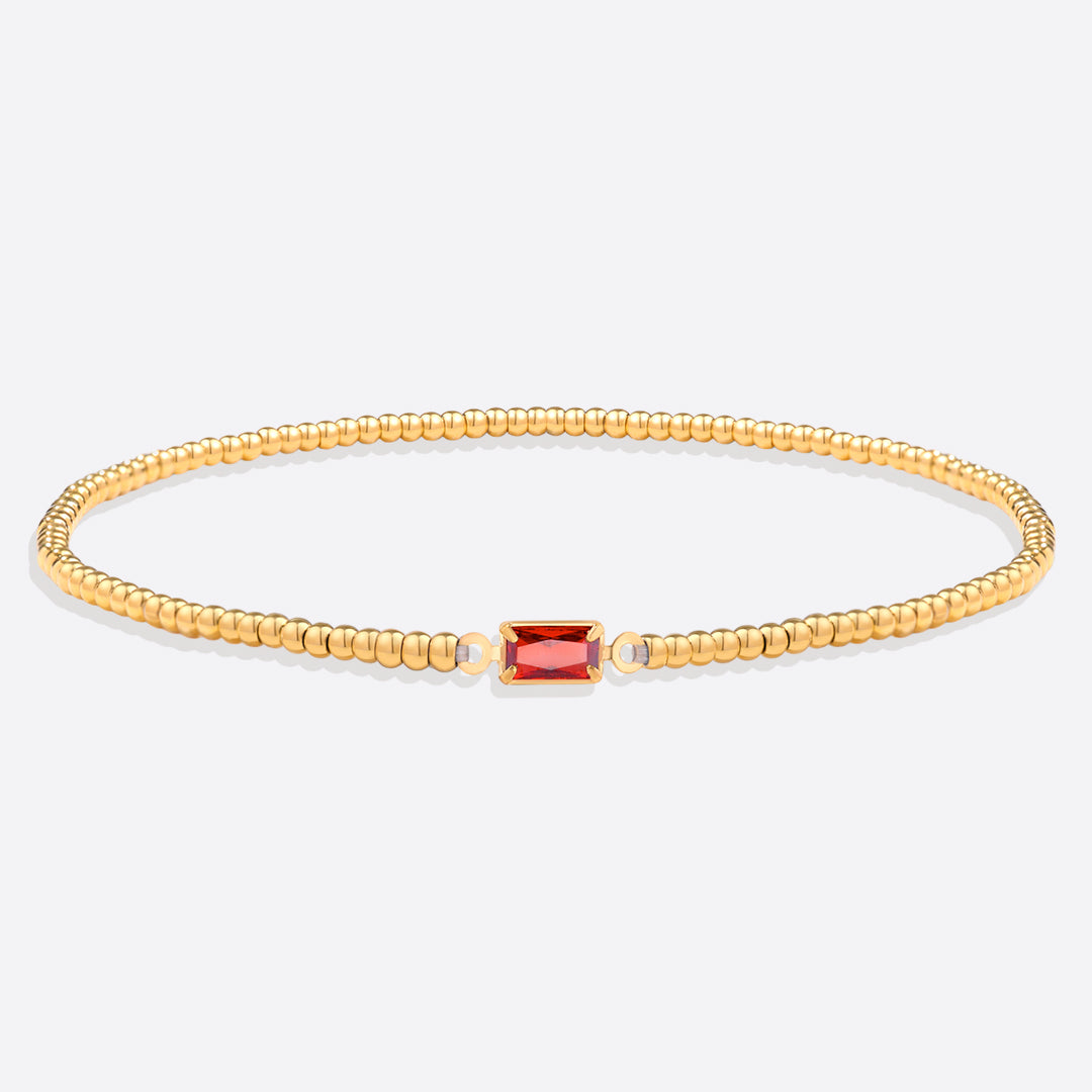 Bracelet of gold beads with birth stone