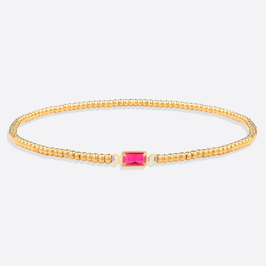 Bracelet of gold beads with birth stone