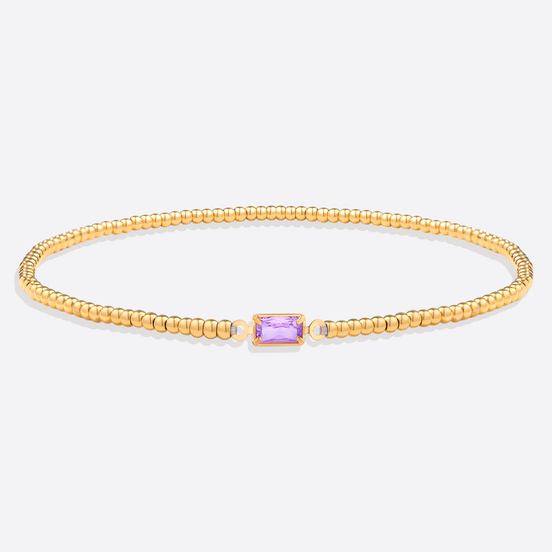 Bracelet of gold beads with birth stone
