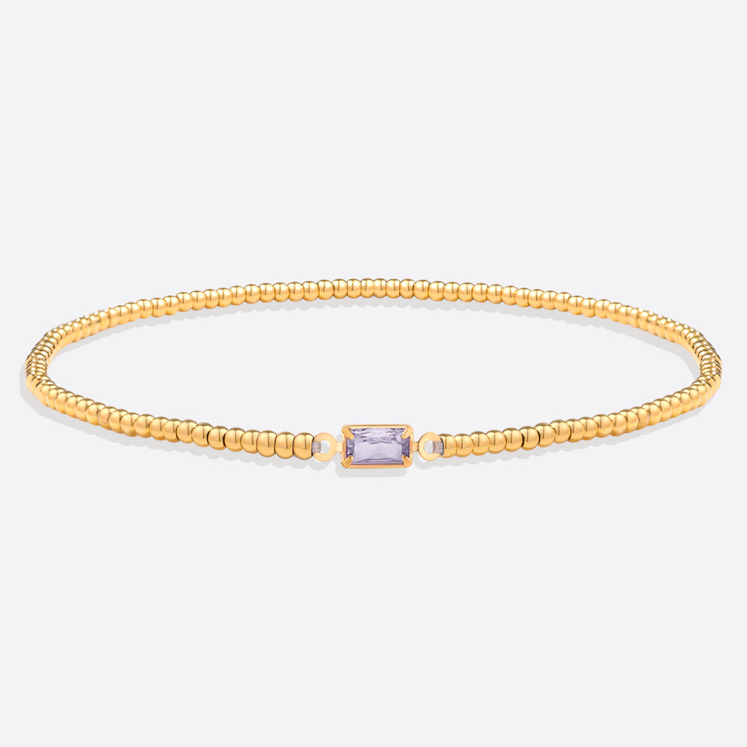Bracelet of gold beads with birth stone