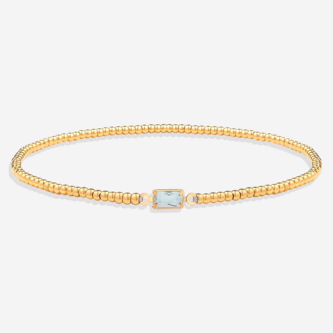 Bracelet of gold beads with birth stone
