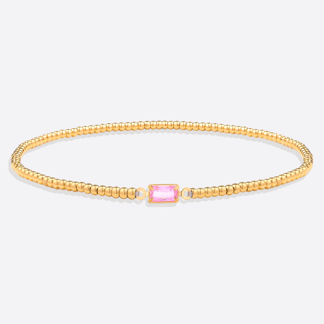 Bracelet of gold beads with birth stone