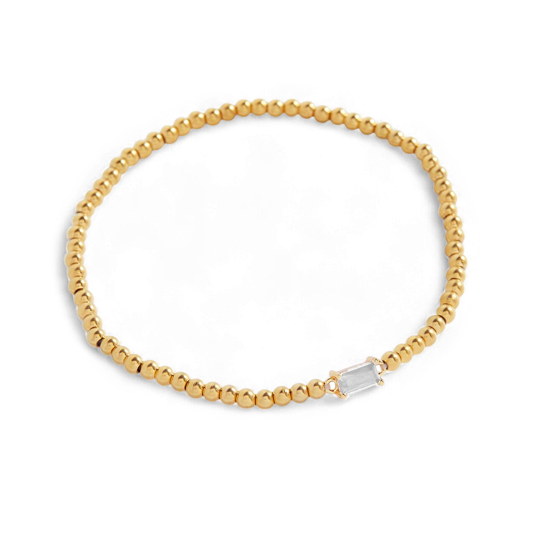 Bracelet of gold beads with birth stone