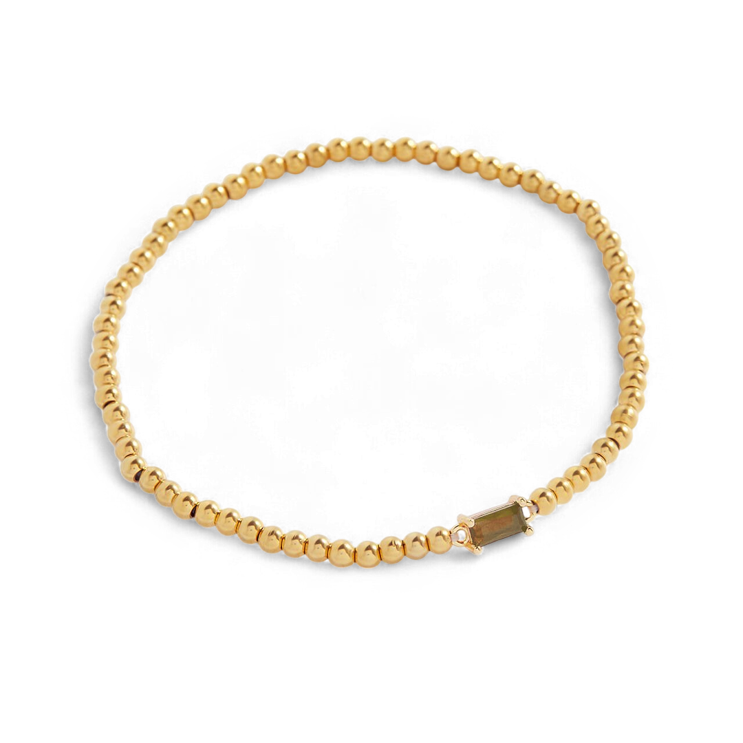 Bracelet of gold beads with birth stone