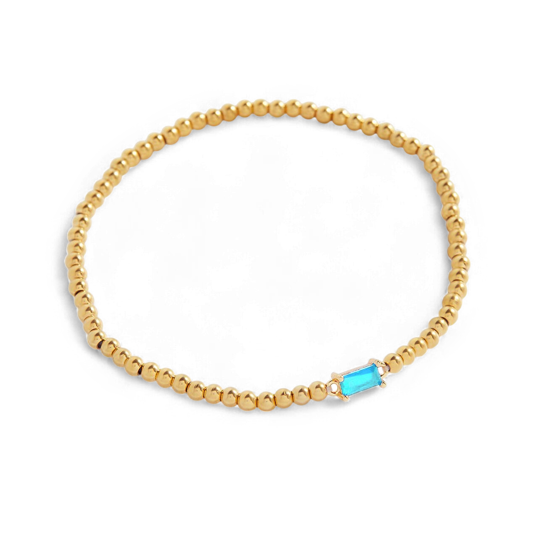 Bracelet of gold beads with birth stone