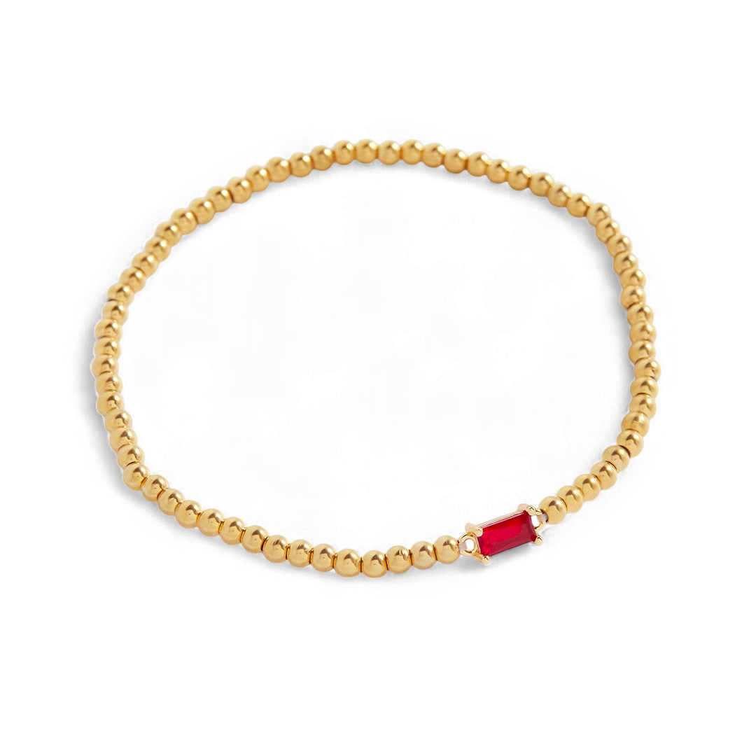 Bracelet of gold beads with birth stone
