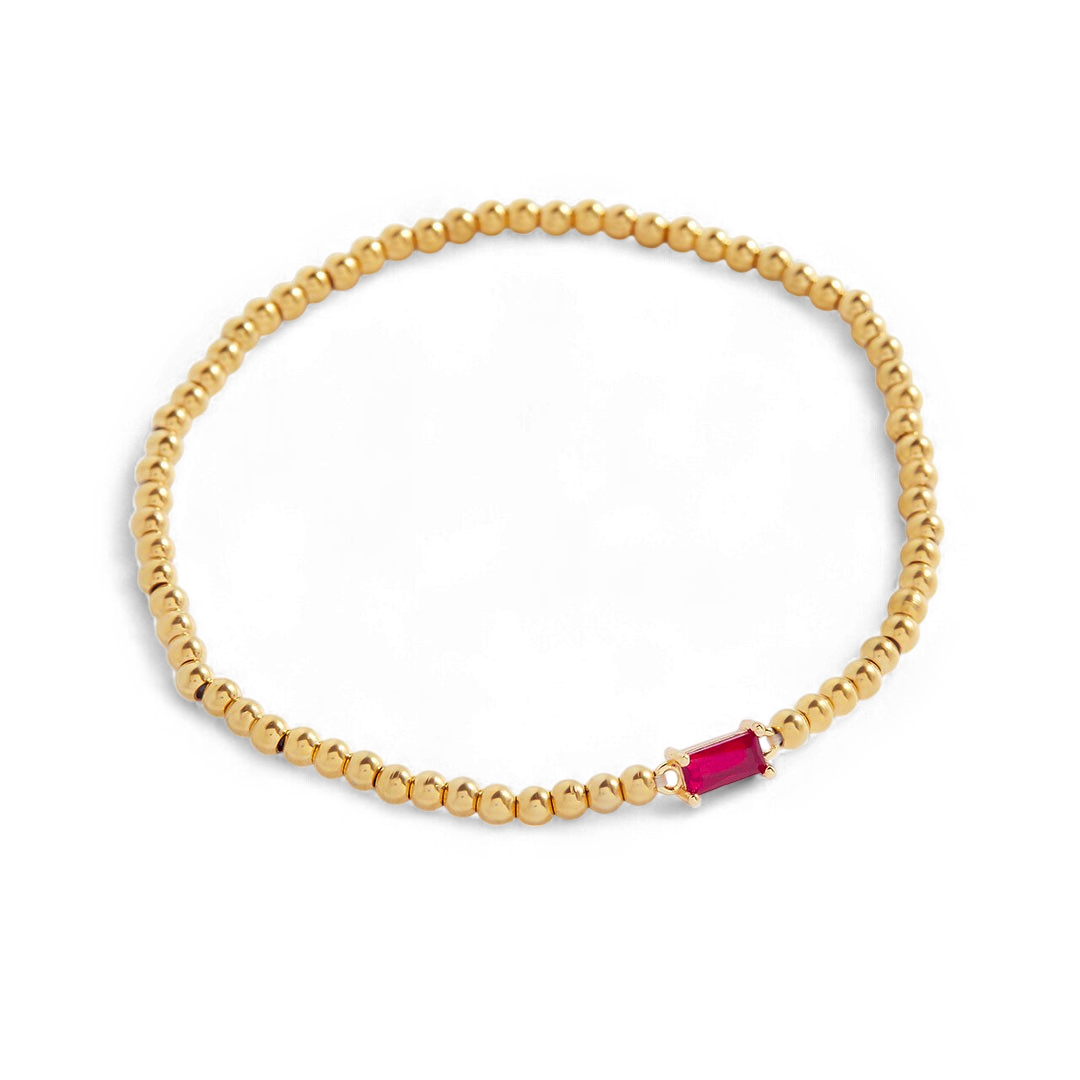 Bracelet of gold beads with birth stone