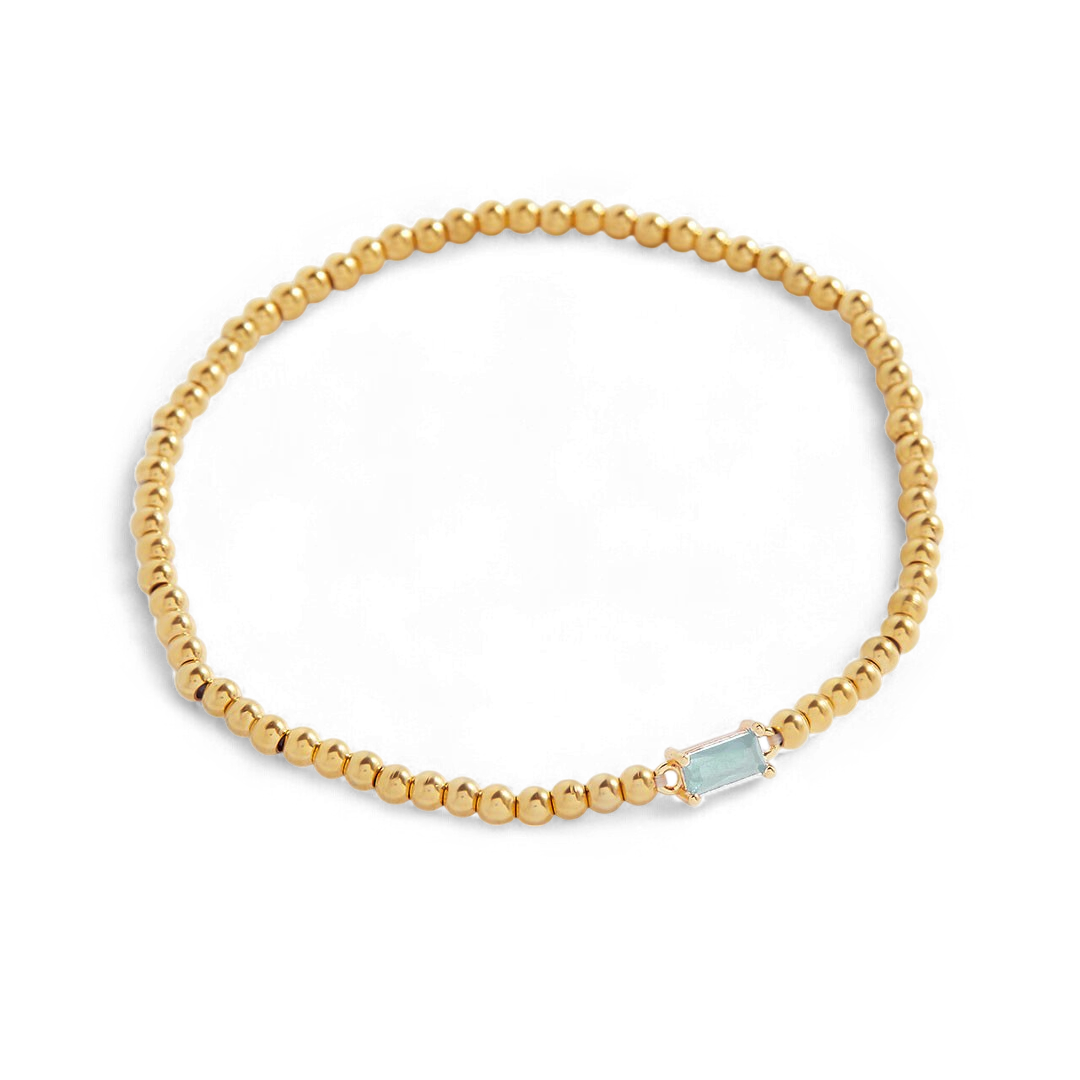 Bracelet of gold beads with birth stone