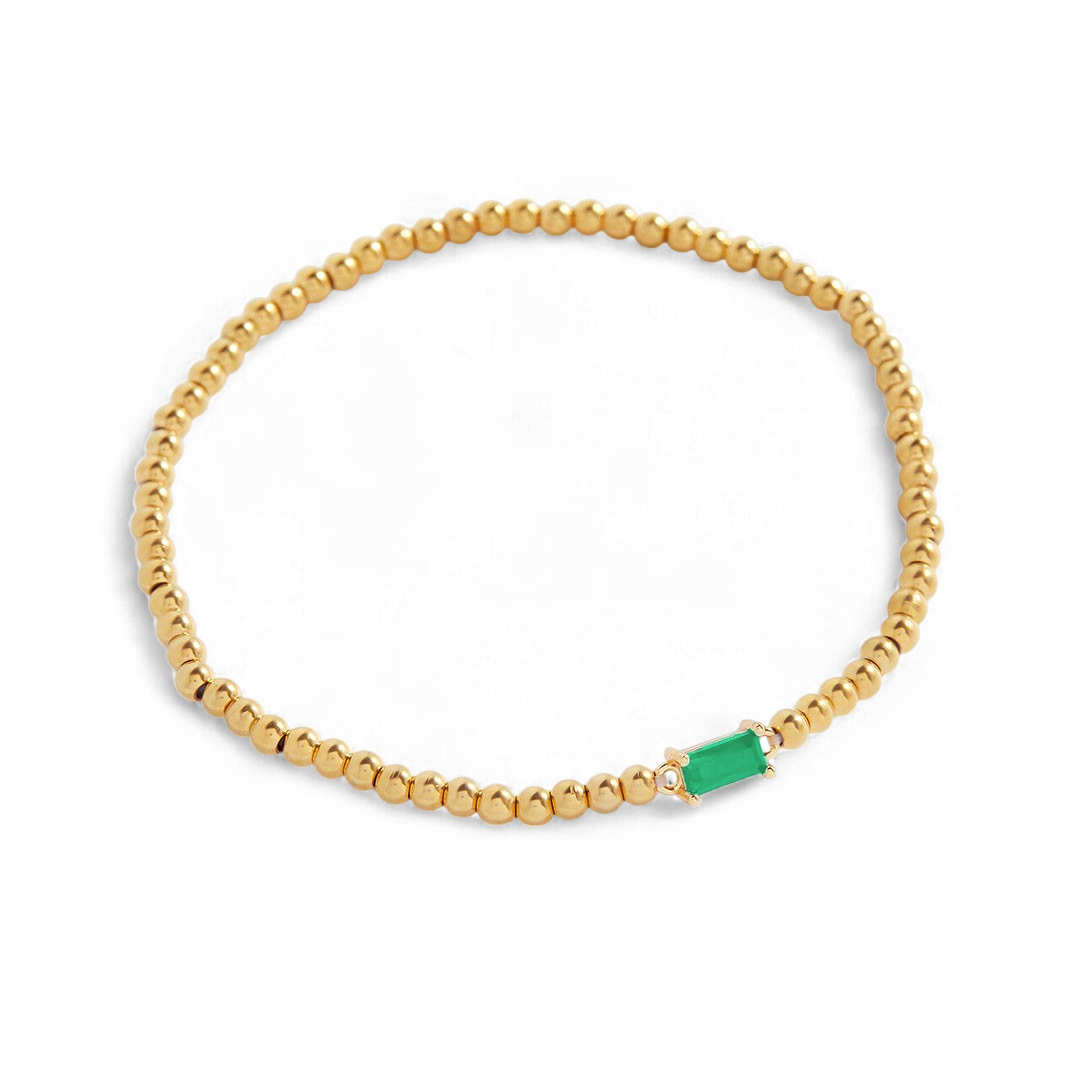 Bracelet of gold beads with birth stone