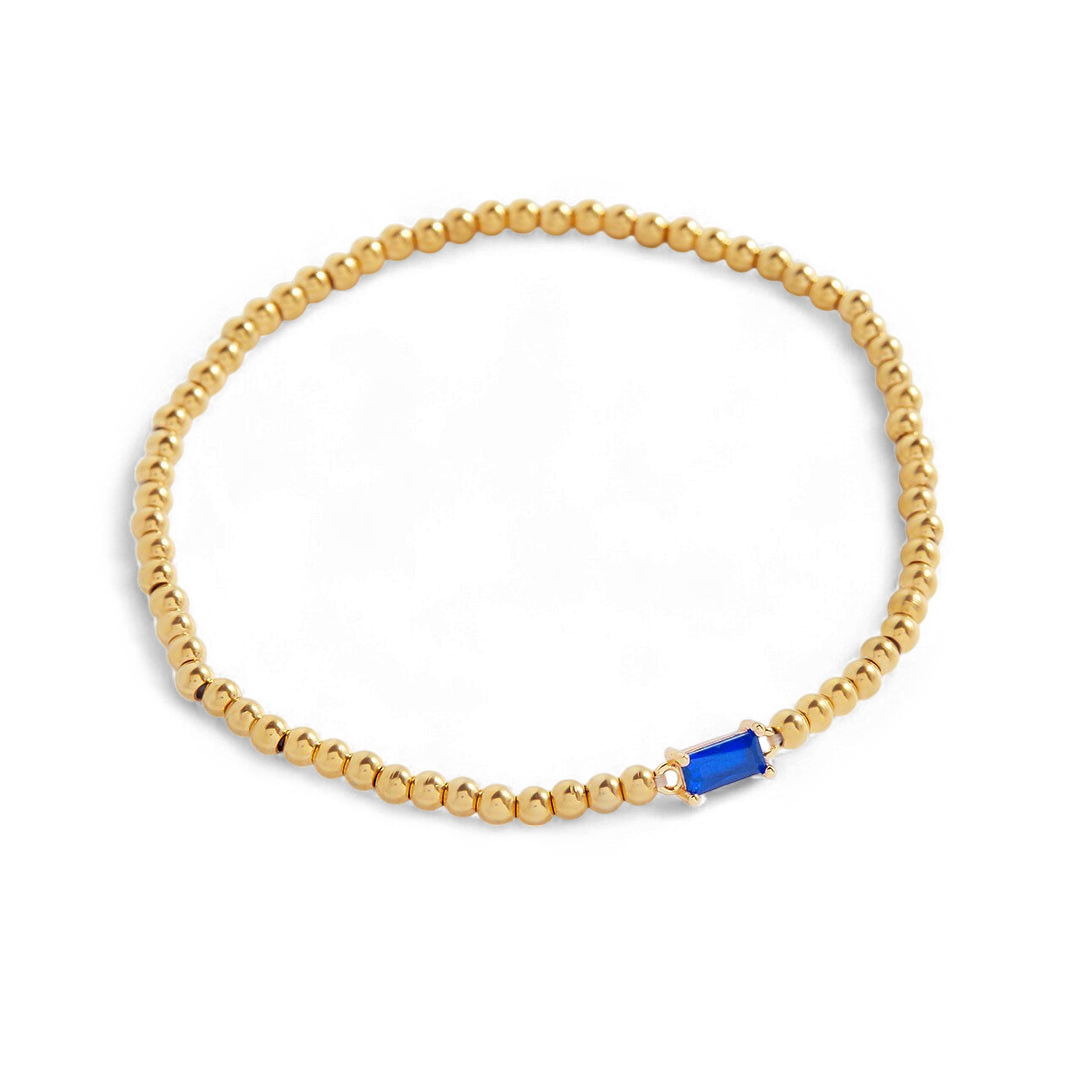Bracelet of gold beads with birth stone