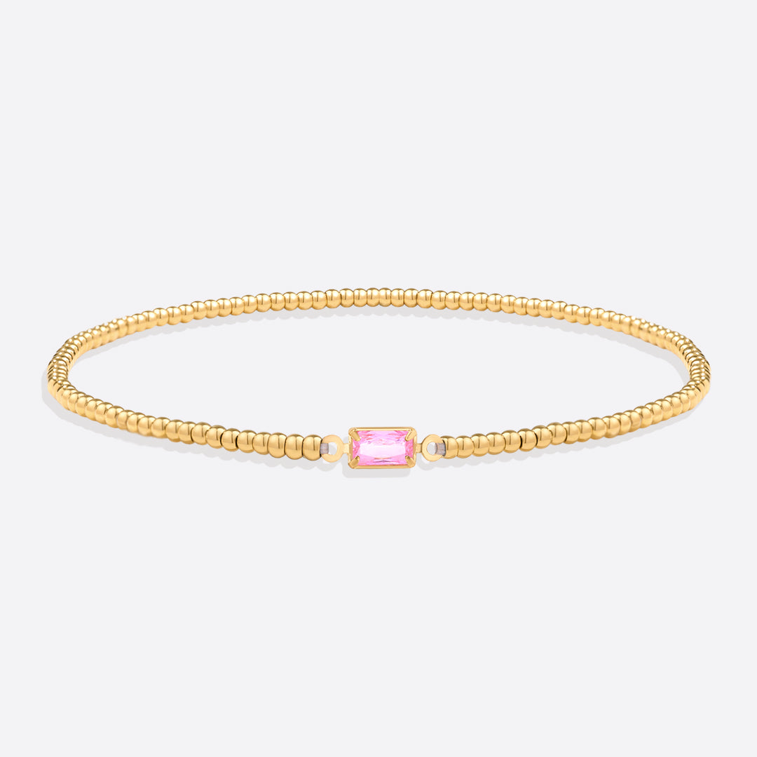 Bracelet of gold beads with birth stone