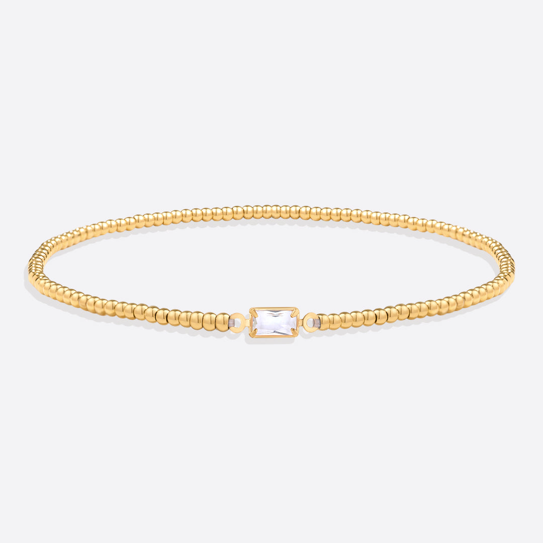 Bracelet of gold beads with birth stone