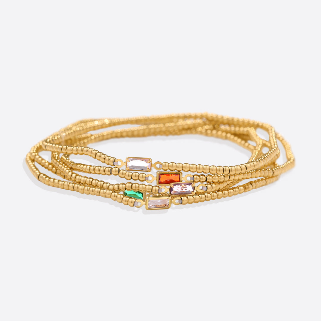 Bracelet of gold beads with birth stone