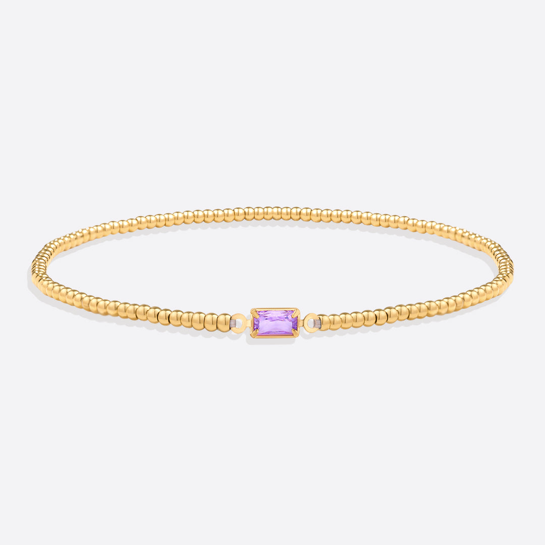 Bracelet of gold beads with birth stone