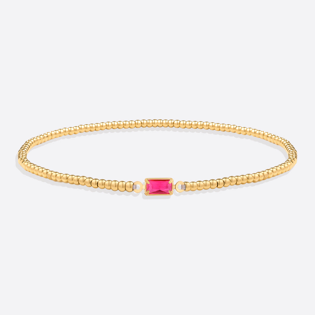 Bracelet of gold beads with birth stone