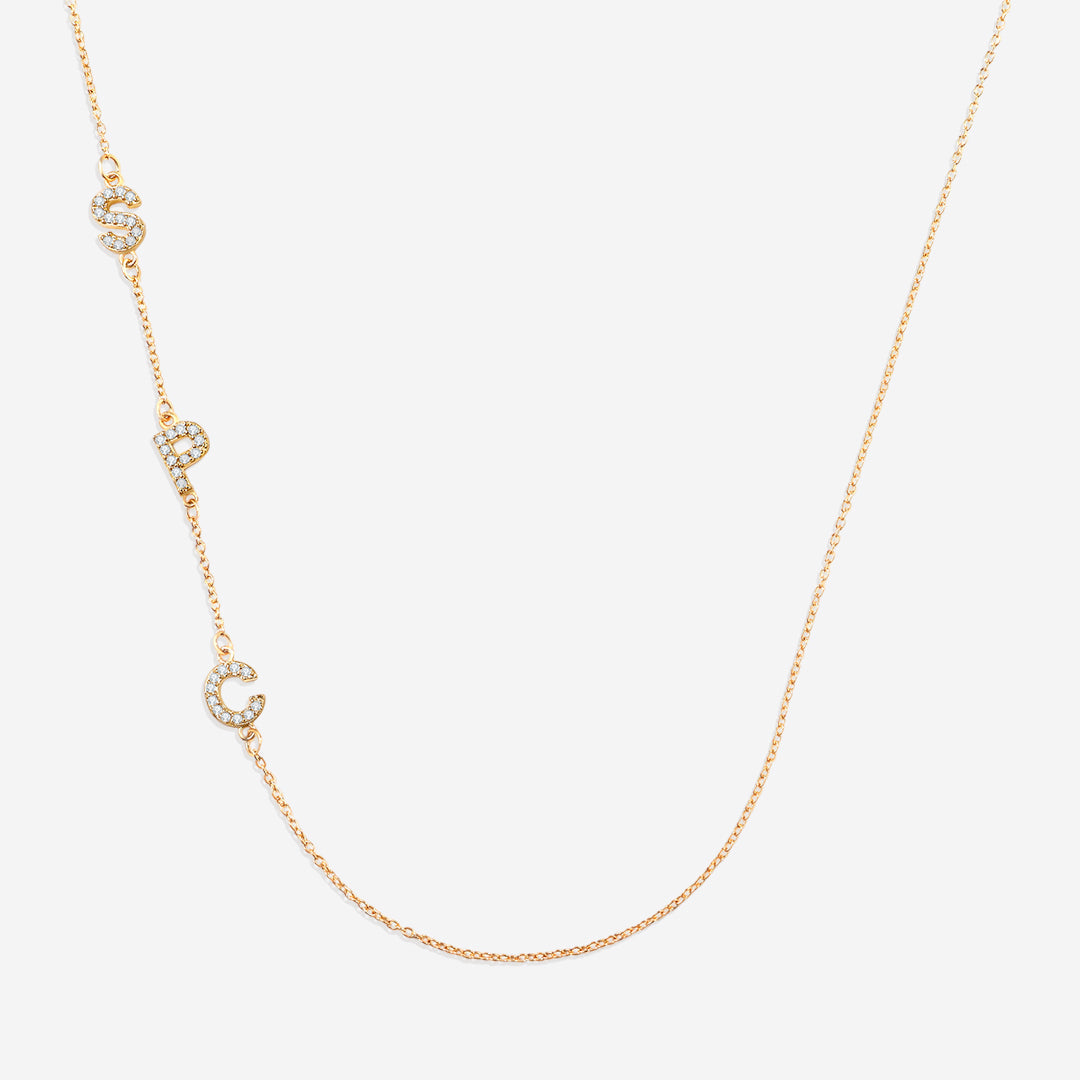 Necklace with the initials pave