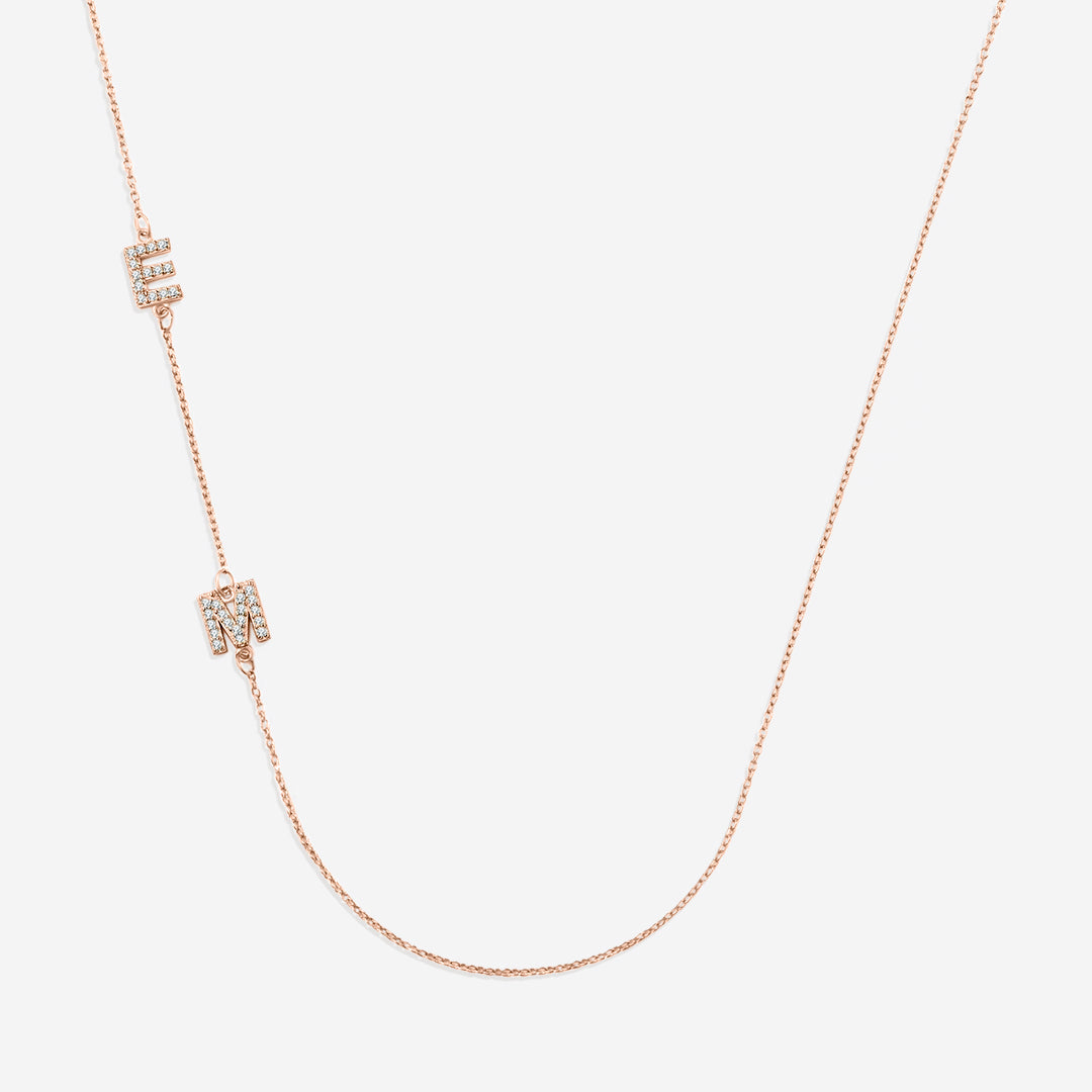 Necklace with the initials pave