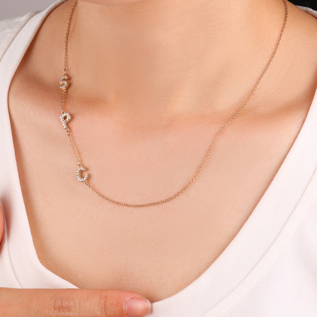 Necklace with the initials pave