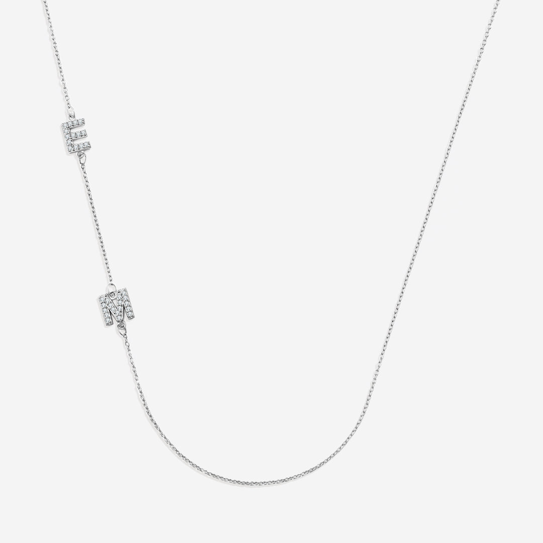 Necklace with the initials pave