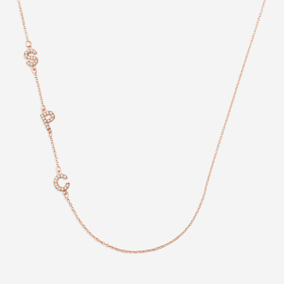 Necklace with the initials pave